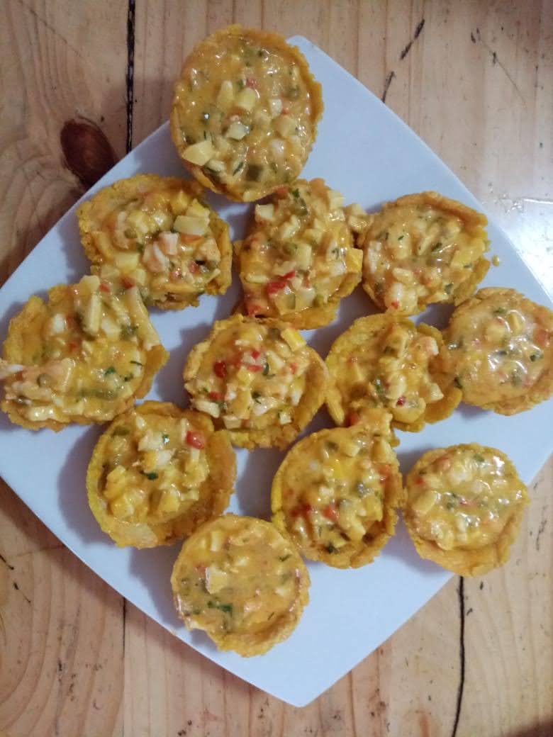 Patacones En salsa de Mariscos